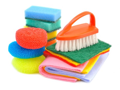 Professional West Kensington carpet cleaners removing embedded dirt from a carpet